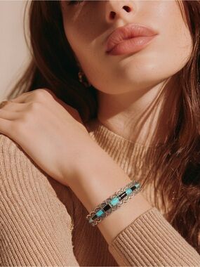 This Sterling silver with Onyx and Opal Stones creates a bold statement.☑️
